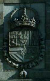 Escudo real de Felipe II en la fachada principal de El Escorial, ap. 1584